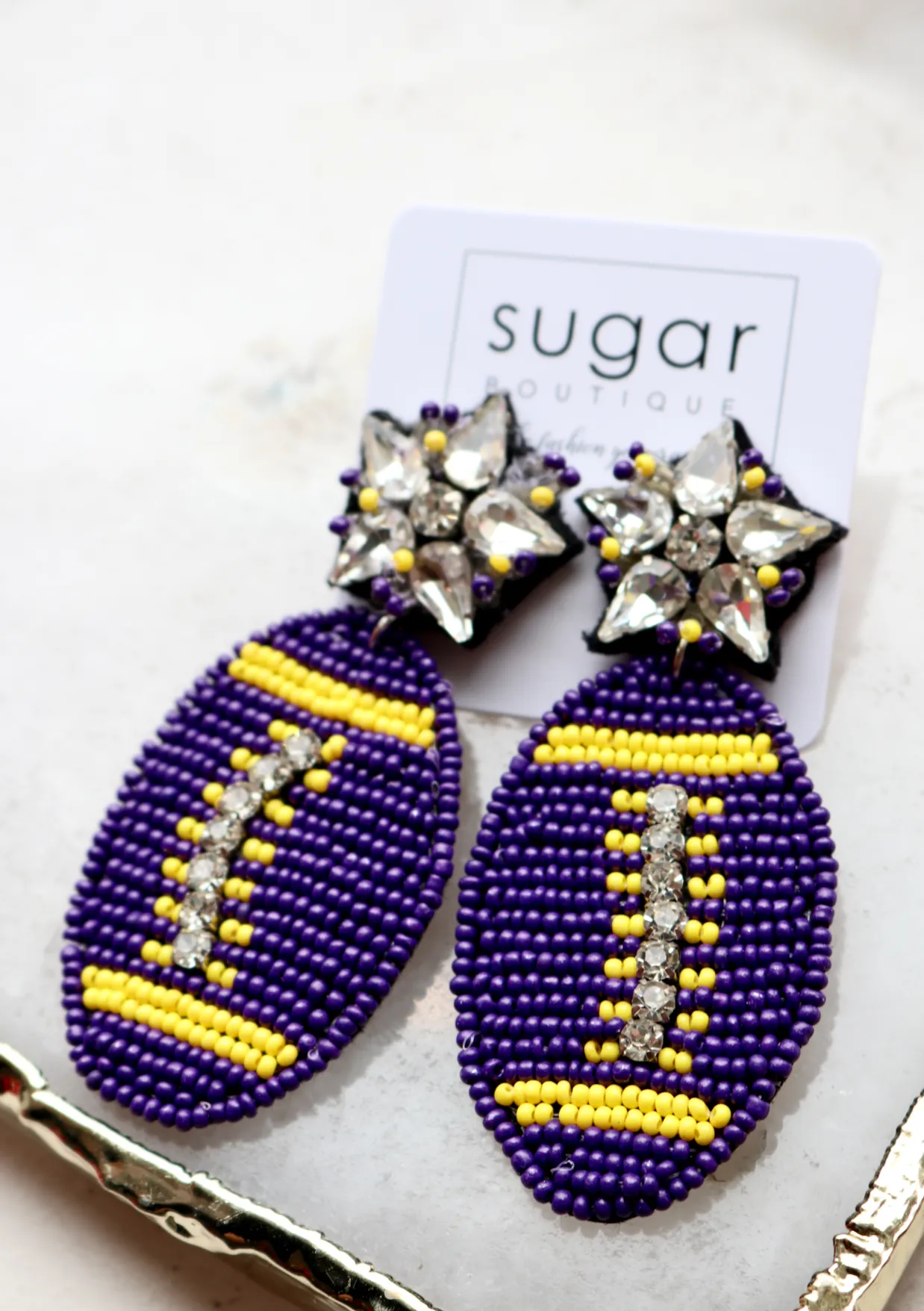 Glitzy Football Earring | Purple   Yellow