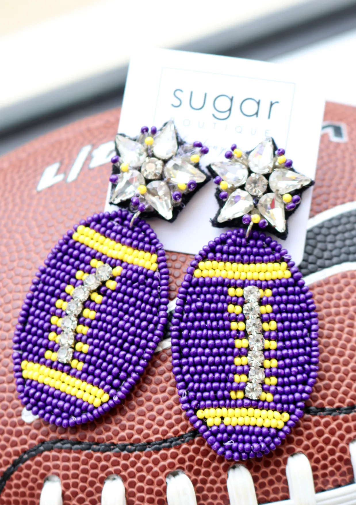 Glitzy Football Earring | Purple   Yellow